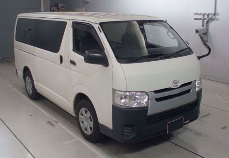 white toyota hiace van